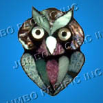 Shell brooches crafted in owl design